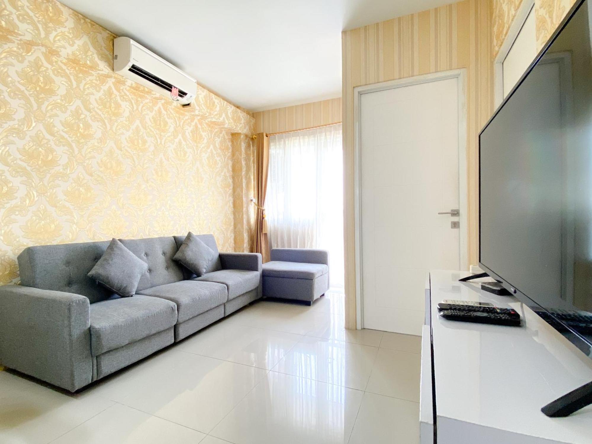 Homey And Comfortable 2br Grand Sentraland By Travelio * Karawang